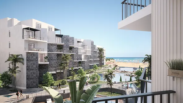 Majra 2 views of pool and building and beach in majra resort hurghada